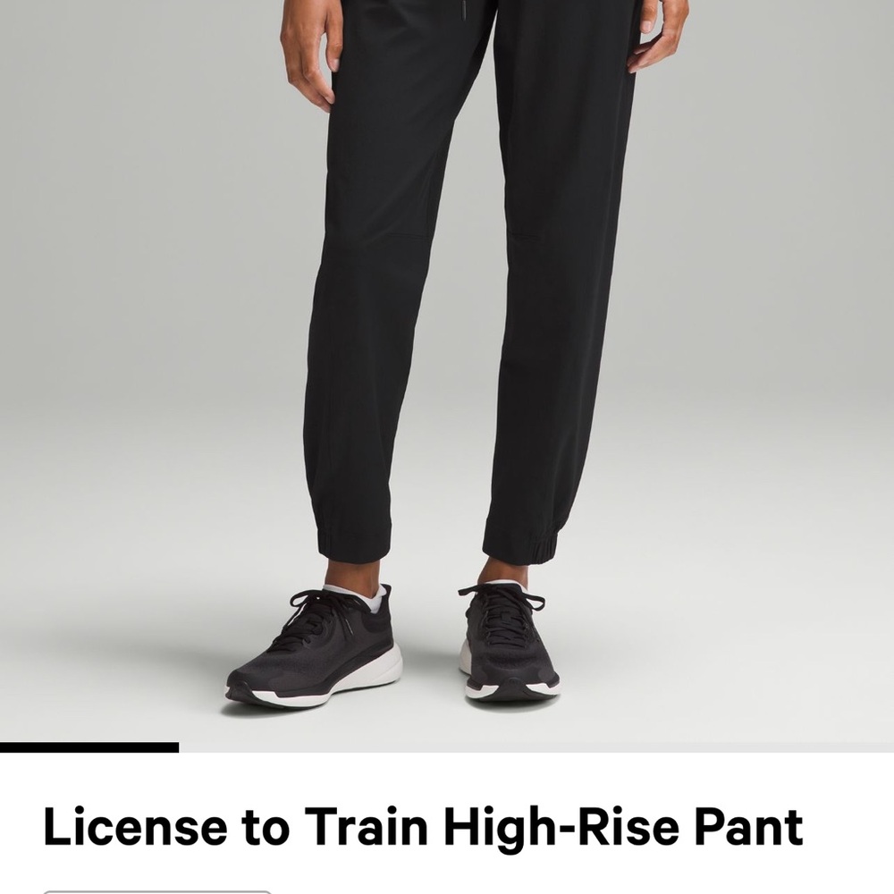 Two pair of size 8 womens “License to Train” high rise pants in black!!